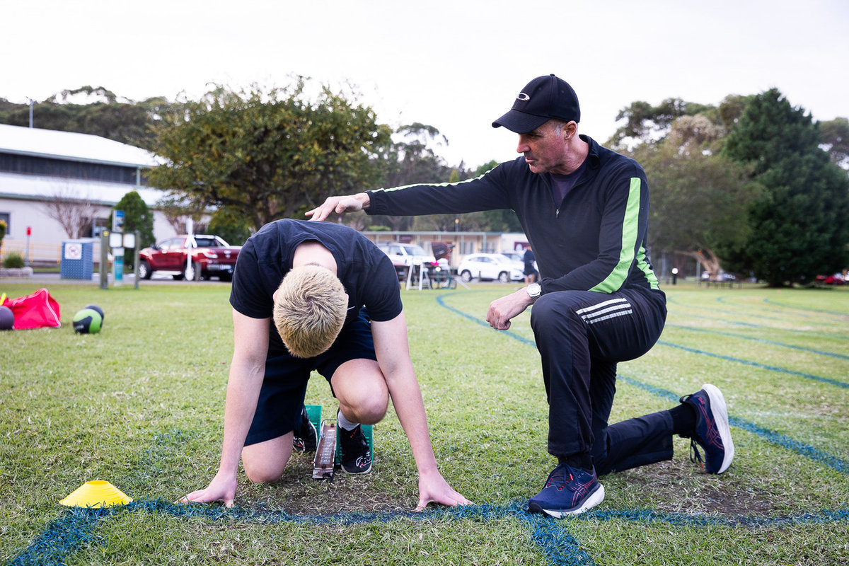 Coach Gary Theodore coaching starting block technique at GT Sprint Coaching, Narrabeen