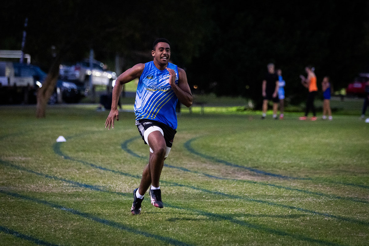 Multi-sport athlete sprinting during GT Sprint Coaching session