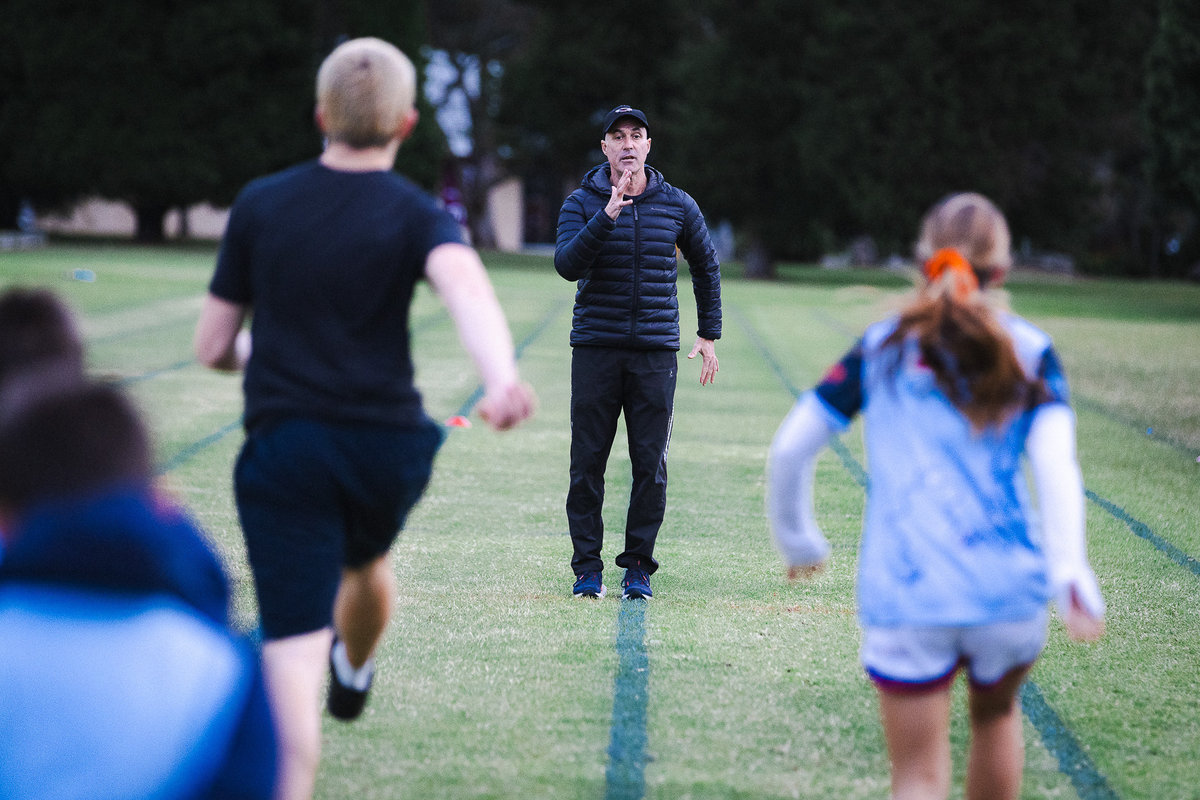 Coach Gary Theodore directing sprint training session at Sydney Academy of Sport, Narrabeen